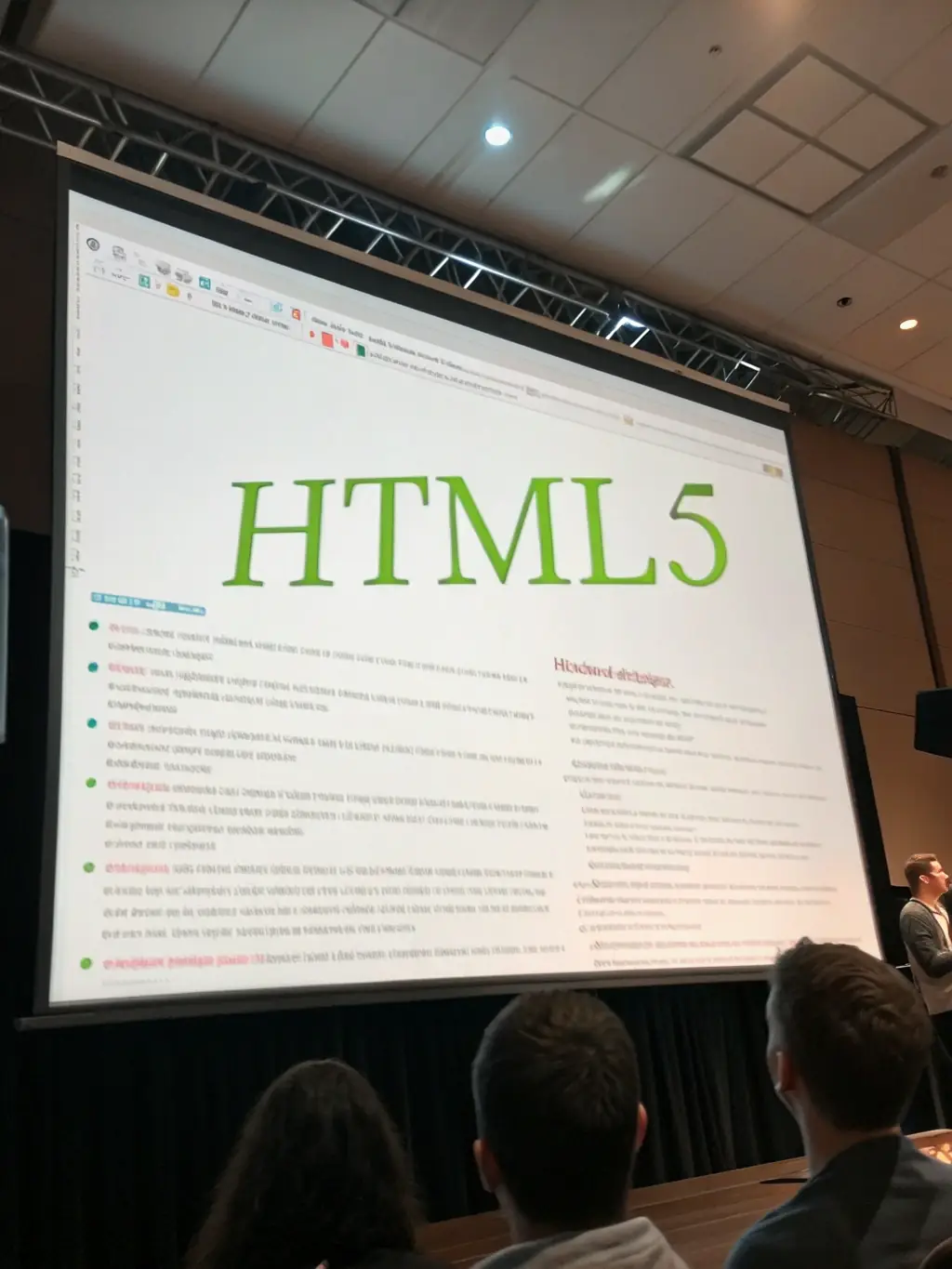 A clean, well-structured HTML5 code snippet displayed on a monitor, highlighting semantic tags and best practices for UK web standards.